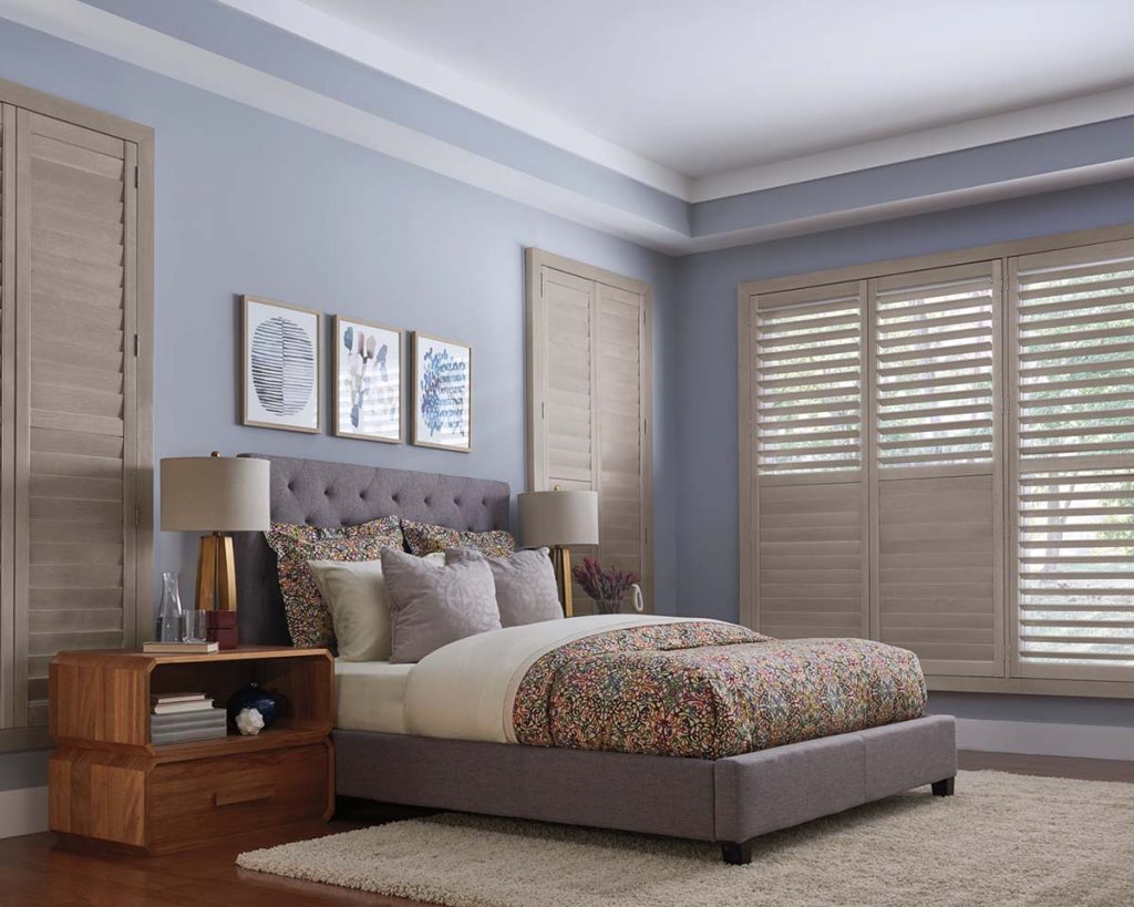 Real wood shutters for homeowners in a modern living room, highlighting style and comfort
